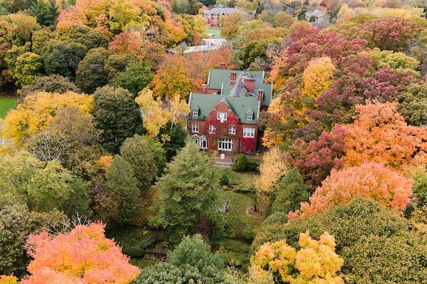 Aerial view of Holmdene Manor surrounded by leaves in the fall
